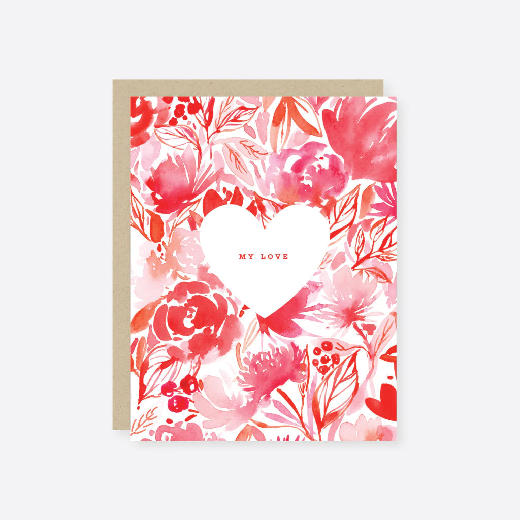 A greeting card with a watercolored pink floral design and a white heart shape, with the phrase 'my love' in the center. The card has a beige background and comes with a matching envelope.