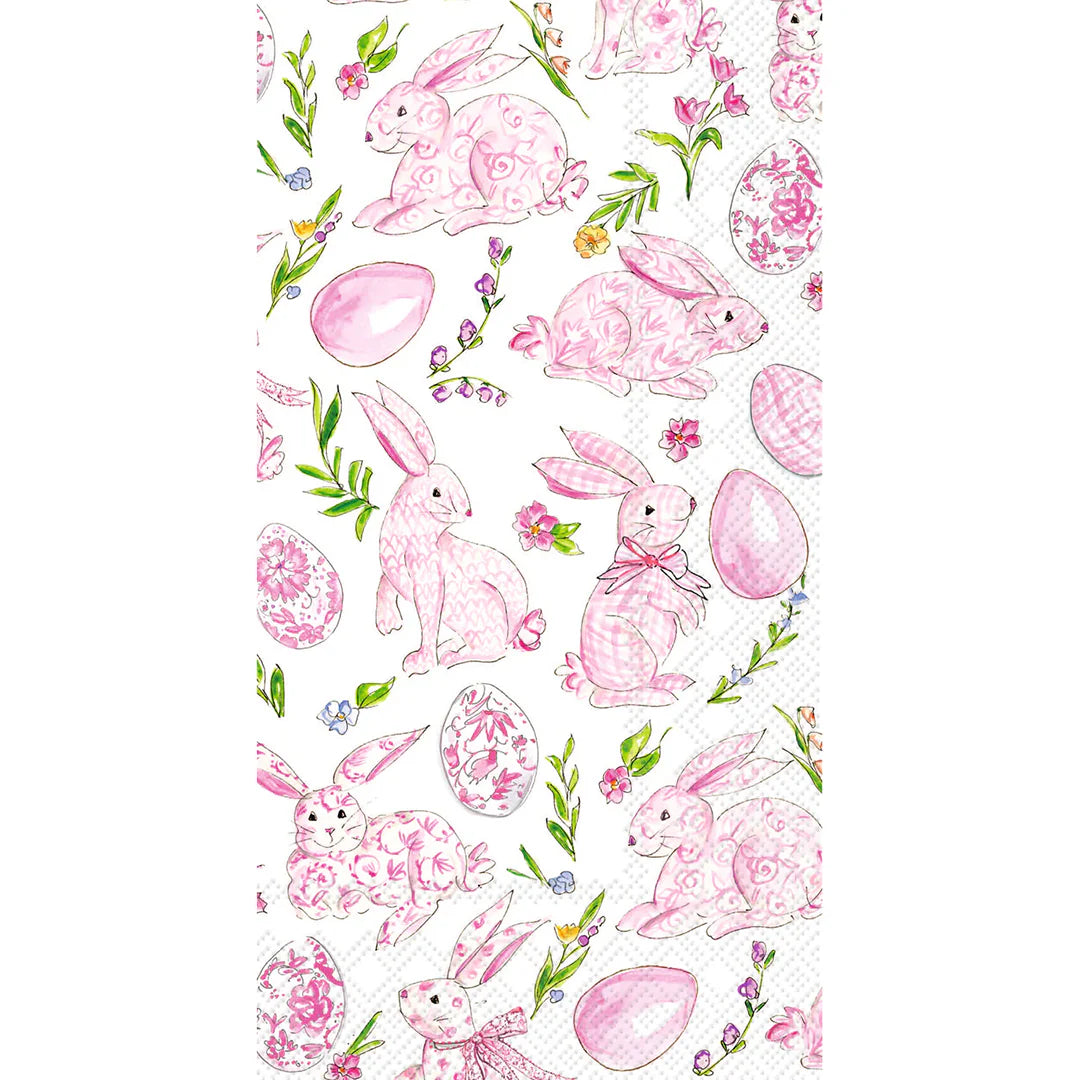 Decorative guest towel featuring soft pink bunnies, patterned Easter eggs, and delicate floral accents on white.