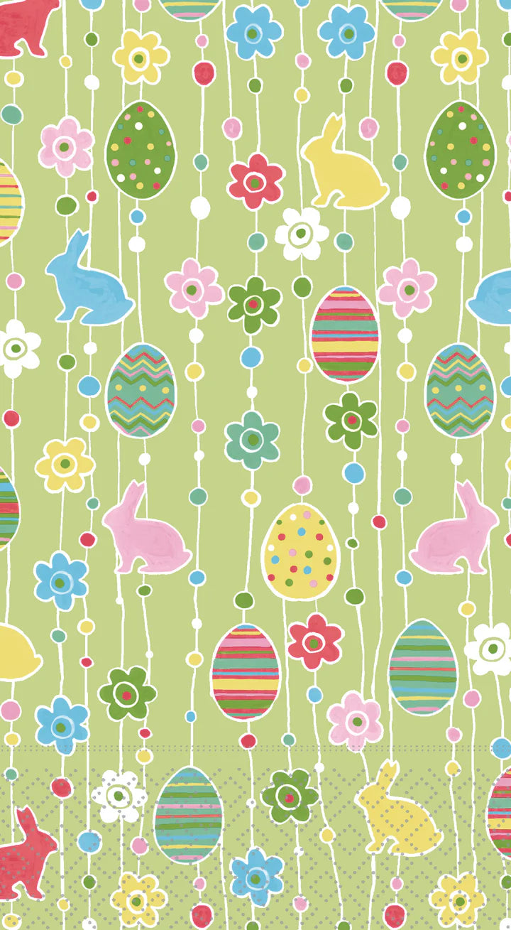 Easter-themed guest towel design featuring pastel rabbits, decorated eggs, and floral shapes arranged on vertical dotted garlands over soft green.