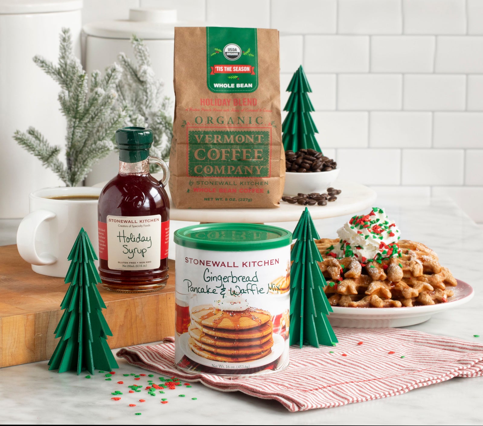 Photo shows a 8.5 fl. oz. bottle of Stonewall Kitchen Holiday Syrup