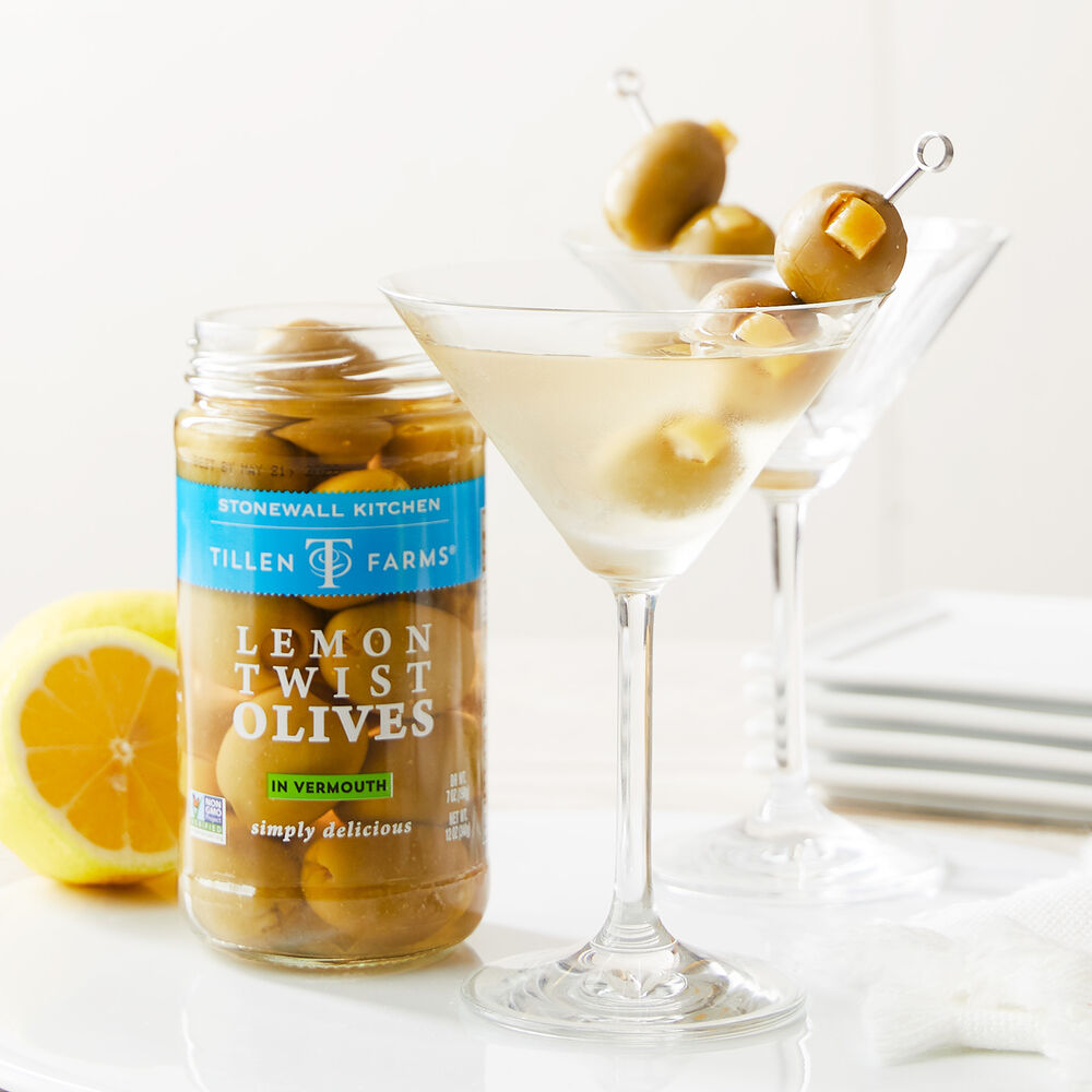 Jar of Tillen Farms Lemon Twist Olives on a white background