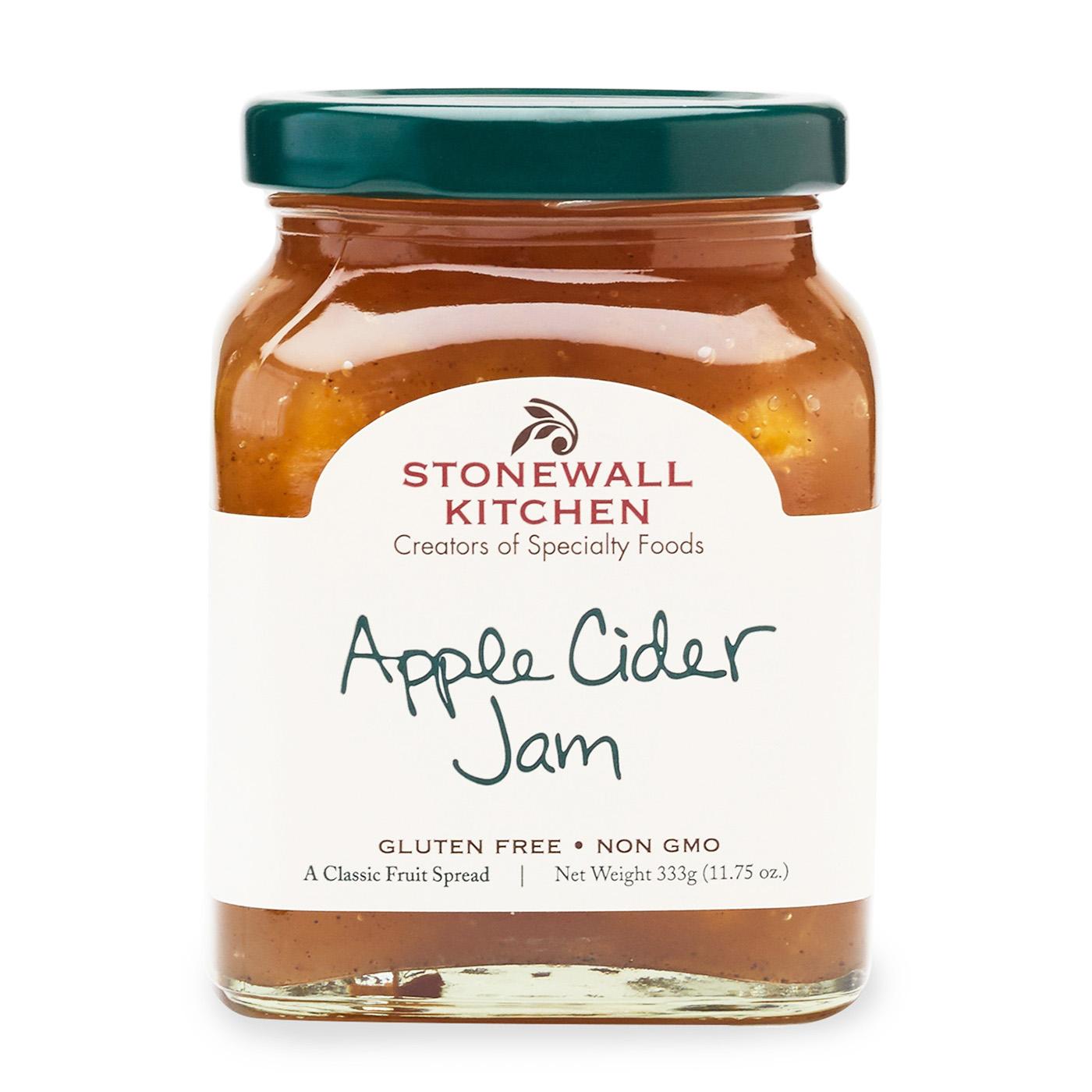 A close-up photo of a jar of Stonewall Kitchen Apple Cider Jam. Stonewall Kitchen Apple Cider jam is gluten free and does not contain any genetically modified ingredients. The jar size is 11.75 ounces or 333 grams.