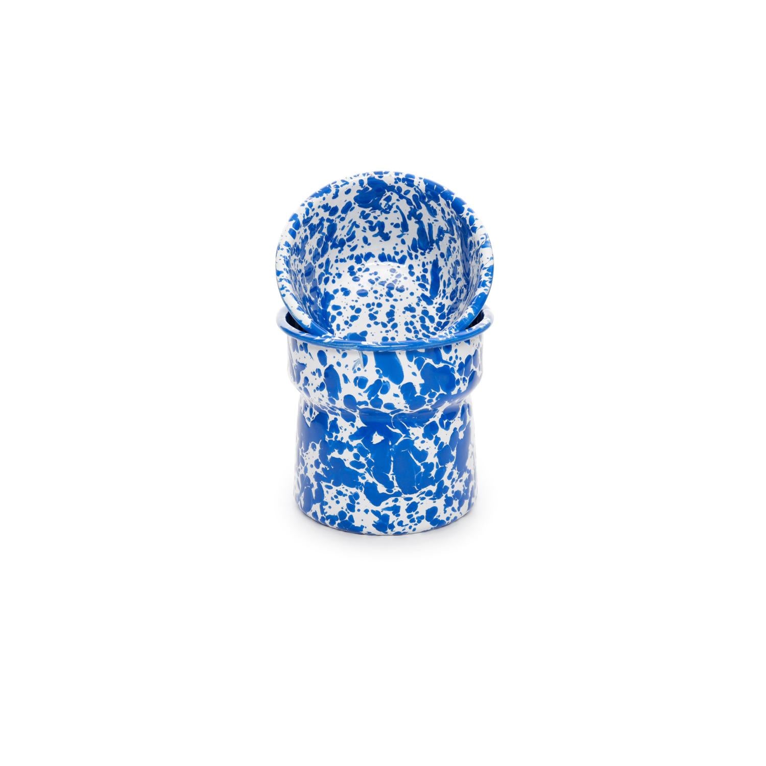Blue splatter enamelware dip chiller set consisting of two stackable bowls, one larger for ice and one smaller for the dip, with a white base and vibrant cobalt blue splatter design.